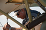 Pilot Kermit Weeks makes adjustments before display of Albatros DV.a 